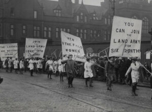 Women's Land Army, Fishergate, Preston Recruiting for Women's Land Army. Procession crossing the Railway Bridge with County Hall in the background. Source: Lancashire Lantern: Image Archive, item 4975