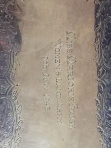 Engraved tray presented to Marjorie Haigh for her work as organising secretary.