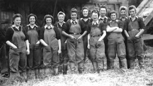 WLA on Burton's Farm, Thorney From BBC article "Mr Finnerty said agriculture faced a new crisis during the inter-war years, with prices for farm produce falling. Thousands of women joined the Women's Land Army during World War Two. What is less well known is that their farm work did not end in 1945 - over 100 land army women were still working in Cambridgeshire's farms in 1950."