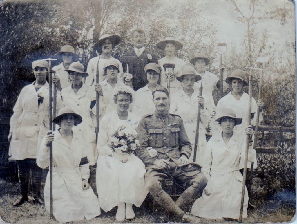 Lillian May Rance standing behind the groom in this photo at Maggie Kent's wedding.