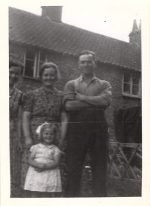 Mrs Ashton, Mrs Cullimore, Mr Cullimore, and June outside "The Ark" at Wutton-on-Edge, 1943.