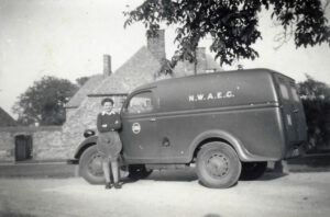 Joyce and her van. Noted as N.W.A.E.C. at Brackley hostel 1946/47.