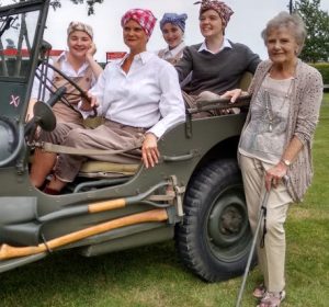 Lilies on the Land cast members with former 1940s Land Girl Zeita at Thurleigh 306BS Museum 4 August 2019 Photo by Stuart Antrobus