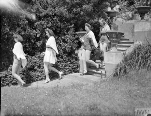 Land girls staying at St Elmo's WLA Rest House, Torquay, go swimming during their paid holiday. Photo courtesy of the Imperial War Museum.
