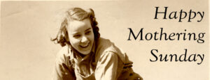 A cropped image of a Land Girl digging