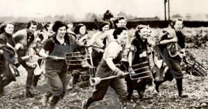 The ploughgal lunchward runs her cheery way featured